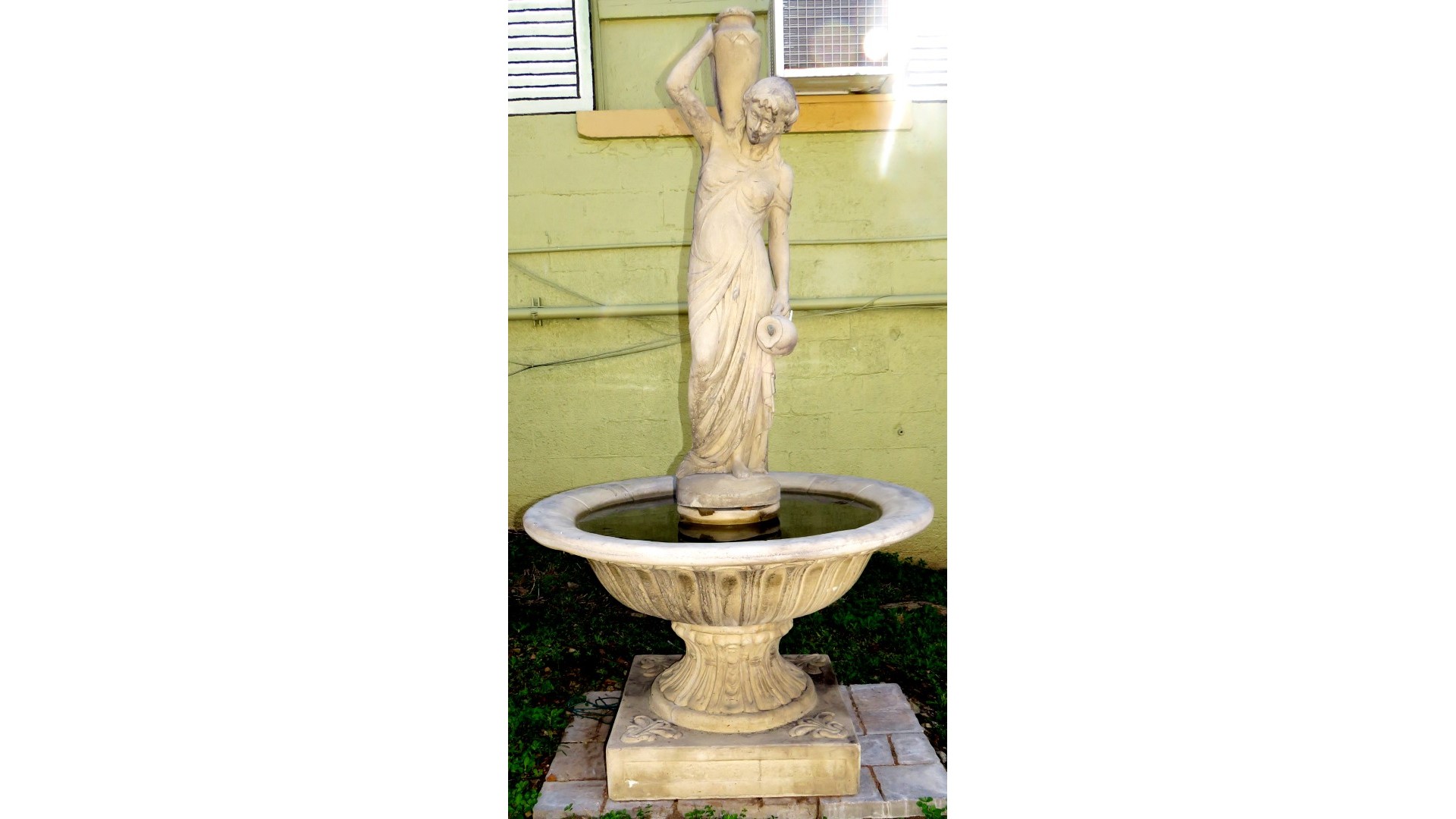 Cast stone fountain with Rebbecca at the well