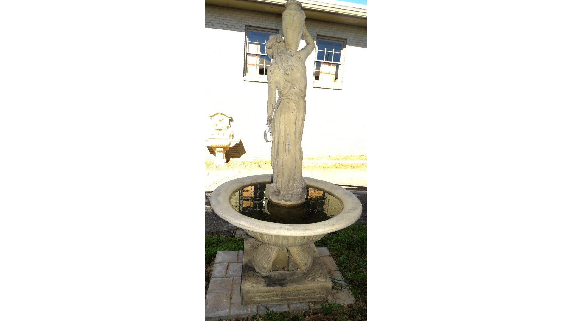 Cast stone fountain with Rebbecca at the well